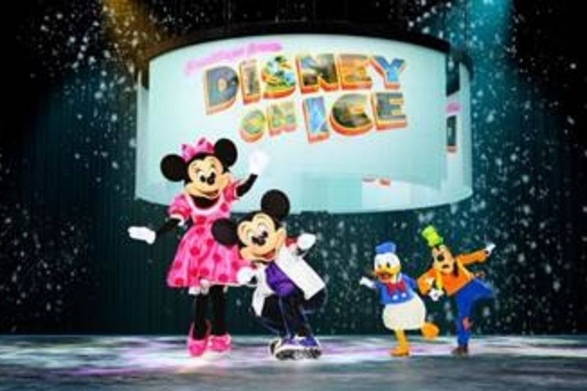 Mickey and Minnie ice skating with Donald Duck.