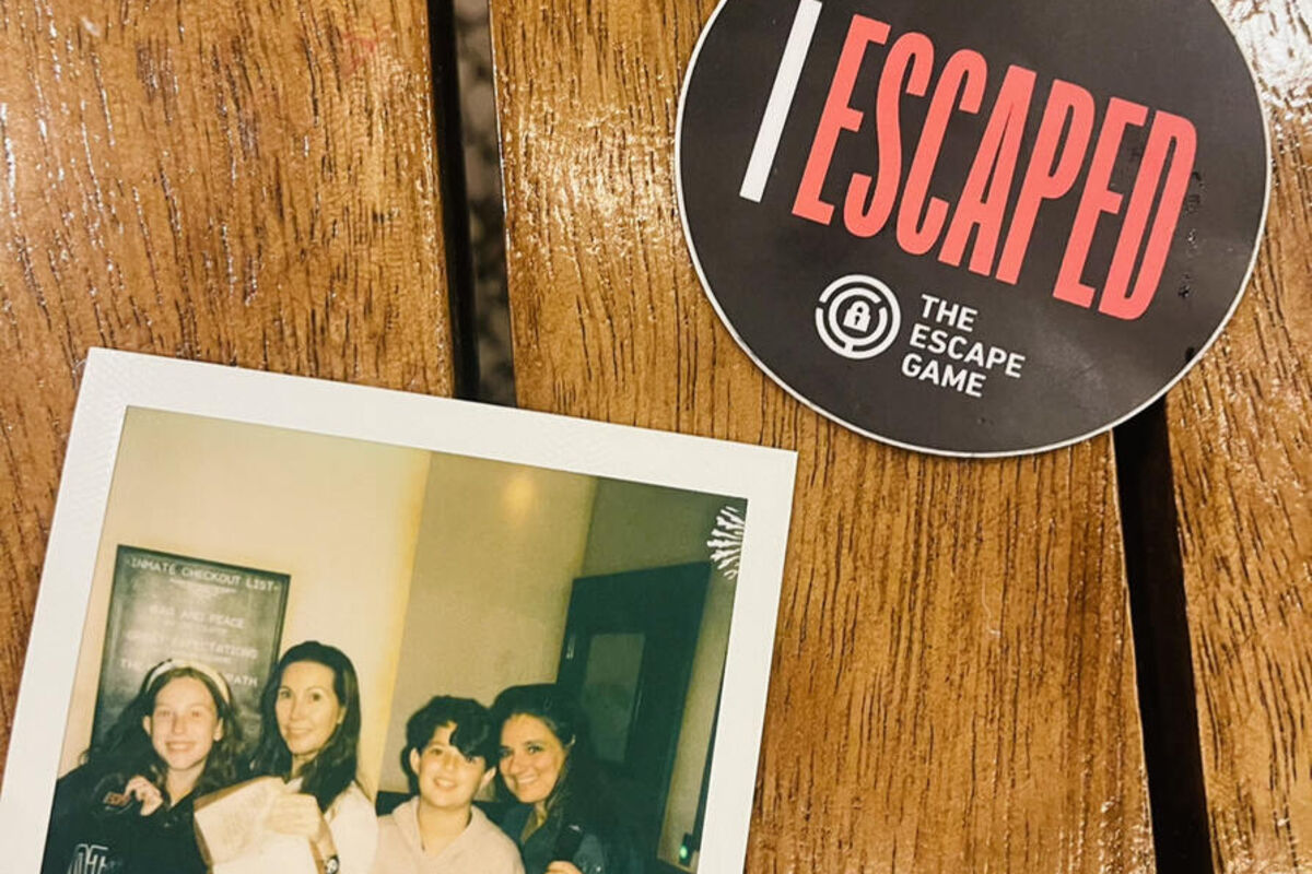 A polaroid photo of family attending an escape room in Los Angeles